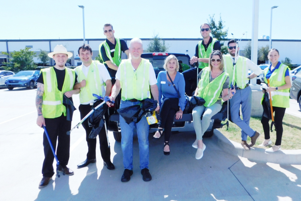 Subaru employees get ready for trash pickup